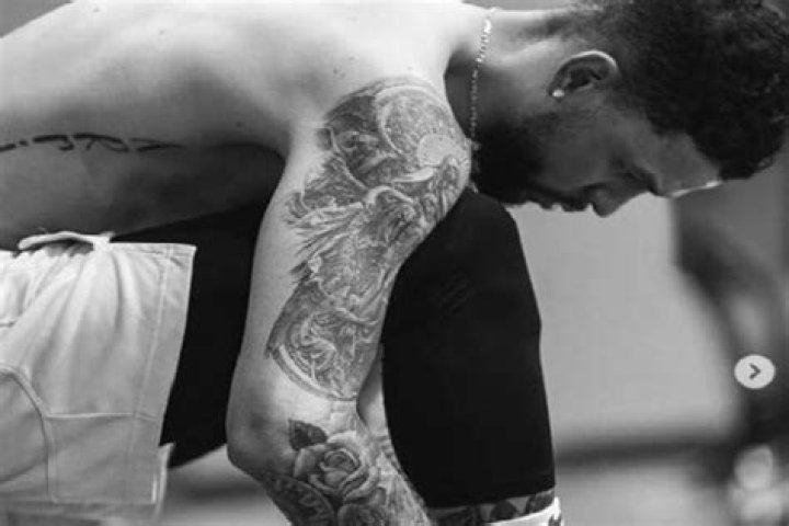 
NBA Player Austin Rivers’ Tattoos And Their Meaning
